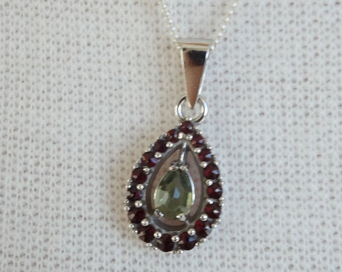 Silver pendant Andromeda with Czech garnets and faceted natural green moldavite - vltavin Ag 925/1000, 22 K, +Rh certificate authenticity