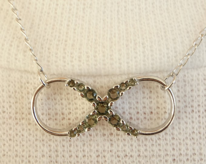 Silver necklace infinity with natural faceted tiny Czech green meteorite moldavites-vltavin Ag 925/1000, 22K + Rh certificate authenticity