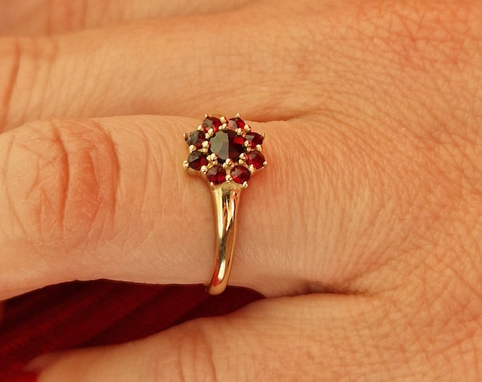 Ring with a scattering of natural round Czech garnet pyrope  scattering 925 Sterling Silver 22 K, 585 White Gold 14 K, 585 Yellow Gold 14 K