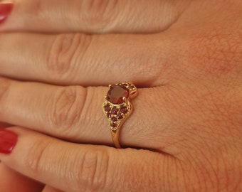 Gold garnet engagement ring January birthstone in white and yellow gold Sterling Silver 22 K+Rh, 585 White Gold 14 K, 585 Yellow Gold 14K