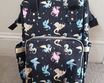 Mochila grande para cambiar pañales de bebé con forma de dragón