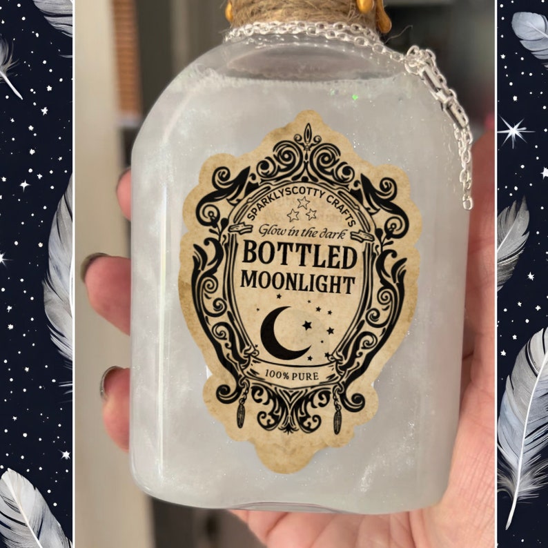 May include: A clear glass bottle filled with a shimmering white liquid, featuring a decorative tan label with black text reading "SPARKLYSCOTTY CRAFTS Glow in the dark BOTTLED MOONLIGHT 100% PURE" and a crescent moon icon. The bottle neck is wrapped in twine.