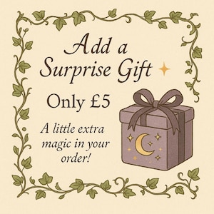 May include: A square graphic with a green ivy vine border on a cream background. Text reads: Add a Surprise Gift, Only &pound;5, A little extra magic in your order! A purple gift box with a dark ribbon and a gold crescent moon and star icon is included.