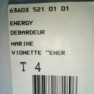 May include: A white tag with black text and a barcode. The text reads "63603 521 01 01", "ENERGY", "DEBARDEUR", "MARINE", "VIGNETTE "ENER", "T 4", and "3379580871896".