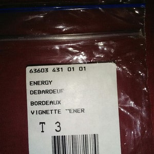 May include: White tag with black text and barcode. The text reads "63603 431 01 01", "ENERGY DEBARDEUR", "BORDEAUX", "VIGNETTE "ENER", "T 3", and "116 3379580871674".