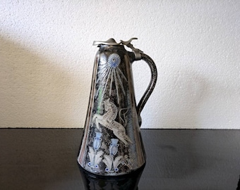 Westerwald art pottery carafe. Salt  glaze. Made and signed by Wim Muhlendyck. Decoration horses, sun and flowers.
