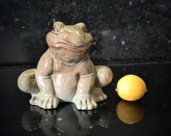 Vintage ceramic glazed frog figurine.