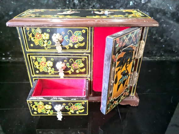 Vintage handpainted lacquer jewelry storage cabinet armoire.