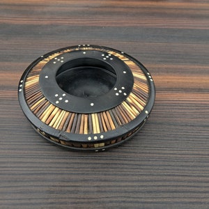 Antique Ebony dish decorated with porcupine quill.