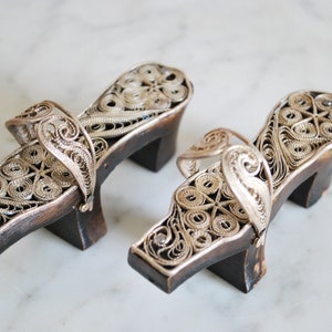 Miniature hamam bath clogs shoes. Filigain silver on wood. Turkish.