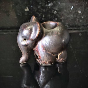 Vintage ceramic elephant censer, incense burner, aroma diffuser.