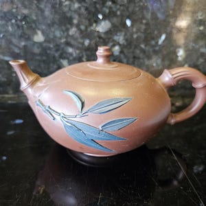 Vintage Yixing Zisha clay handmade teapot.
