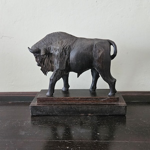 Vintage hand carved solid dark wood buffalo bufa
