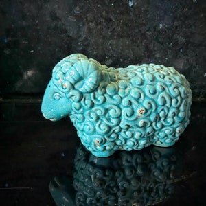 Vintage ceramic glazed blue green sheep figurine statue.