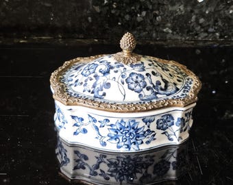 WL 1895 Wong Lee crackled porcelain lidded bowl with bronze decorations.