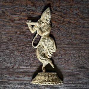 Vintage Brass Lord Krishna with flute wall decoration.