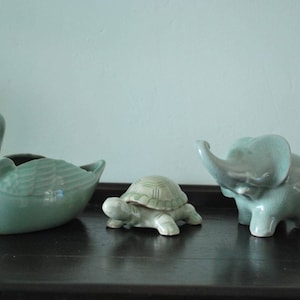 Lot of three celadon animals. Duck Turtle and Elephant.