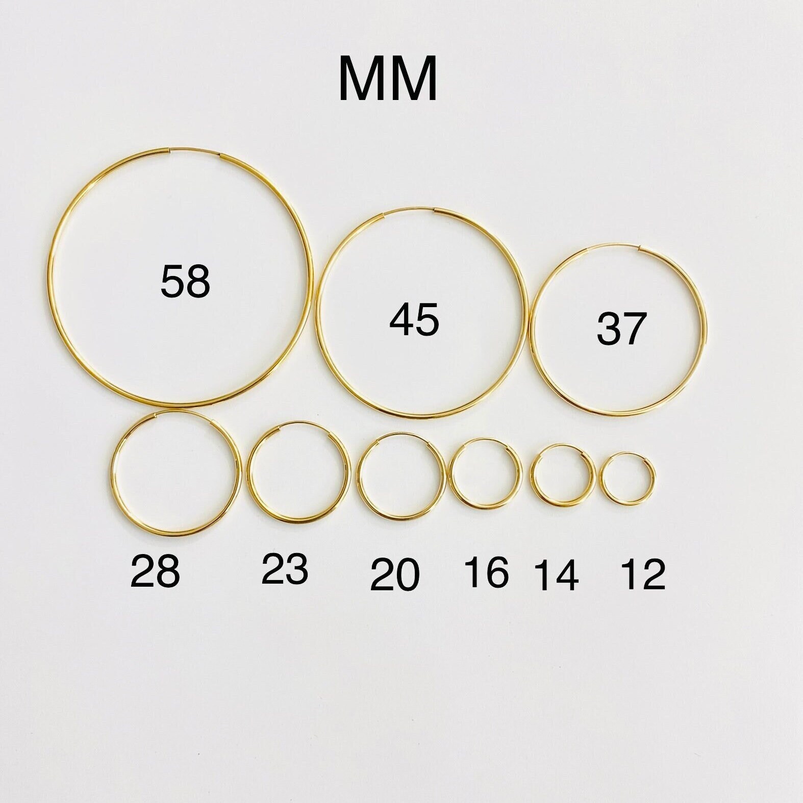 Solid gold on sale endless hoop earrings