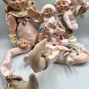 Lot de 3 lutins de Noël roses et dorés, figurines articulées à poser sur une étagère