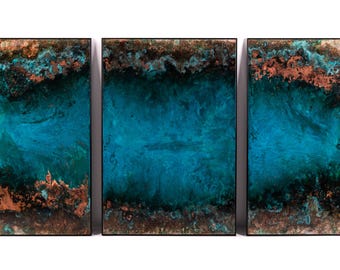 May include: A three-piece abstract wall art set featuring a teal blue and copper color scheme. The artwork has a textured, layered look, reminiscent of water and earth.