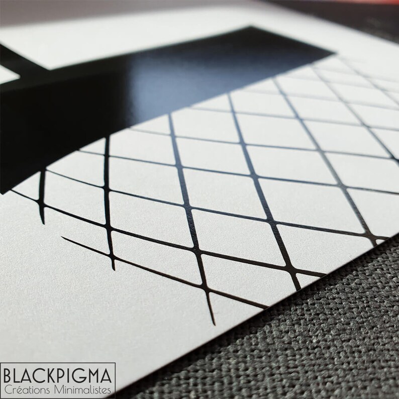 May include: A black and white minimalist design featuring a geometric pattern of intersecting lines forming a grid. The design is printed on a white card with the text "BLACK PIGMA Creations Minimalistes" at the bottom.