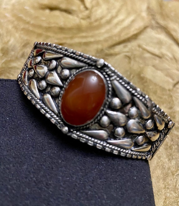 Sterling Silver Repousse and Carnelian Stone Brace