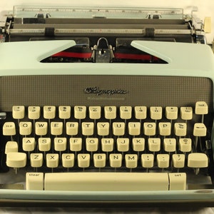 Olympia SM7 Vintage 1961 Macchina da scrivere portatile manuale funzionante, realizzata in Germania occidentale, strumento di scrittura creativa bicolore blu e ardesia