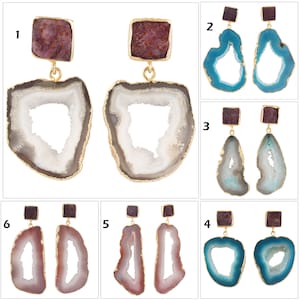 May include: Ten pairs of agate earrings with gold accents. Each pair features a different colour and shape of agate, including white, blue, and pink.