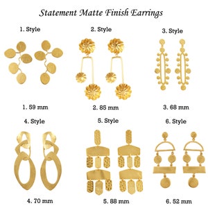 May include: Six pairs of gold statement earrings with matte finish. The earrings are in different styles, including geometric shapes, floral designs, and dangling chains. The earrings are shown against a white background.