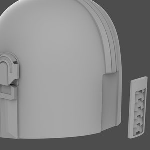 May include: A 3D printed model of a helmet with a visor and a separate piece for the back. The helmet is gray and has a smooth surface.