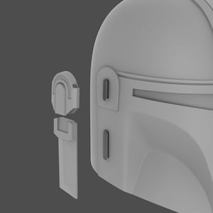 May include: A gray 3D printed model of a Mandalorian helmet with two separate pieces, a visor, and a side panel.