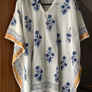 May include: A set of three ceramic mugs with a speckled, matte finish. Each mug features a different color: light blue, cream, and gray. The mugs have a simple, modern design and a comfortable handle.