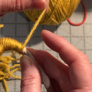 Step photo: Wrapping yarn