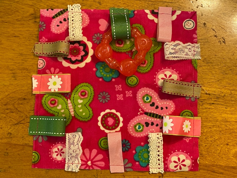 Showing tags sewn onto fabric.