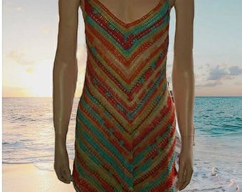 May include: A colorful crochet dress with a chevron pattern in shades of orange, red, green, and blue. The dress is sleeveless and has a V-neckline.