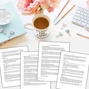 May include: A set of four pages of a workbook with the title "Past Life Regression Therapy" and "Family Dynamics and Relationships". The pages are on a white surface with a cup of coffee, a white keyboard, and pink flowers.