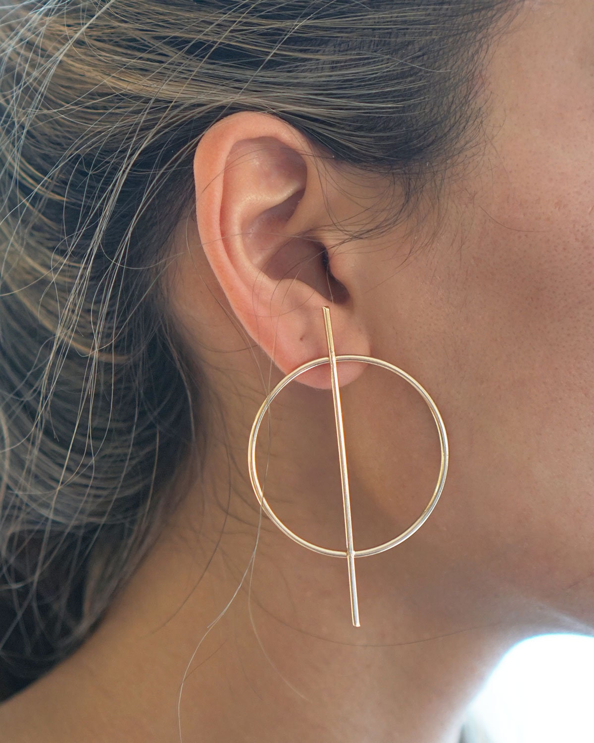 Circle earring with line through deals