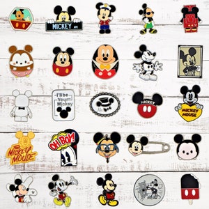 May include: A collection of 24 Mickey Mouse themed enamel pins. The pins feature various images of Mickey Mouse, including Mickey Mouse in different poses, Mickey Mouse with different accessories, and Mickey Mouse with different expressions. The pins are all in different colors and designs.