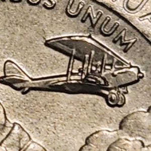 Moneta Bessie Coleman del 2023 con errore di stampa: scheggiatura a forma di aereo e doppio naso sul rovescio. Vedere le immagini.
