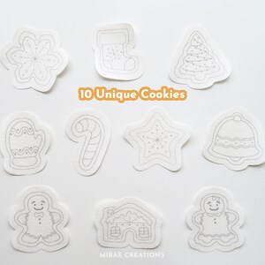 May include: Ten unique Christmas cookie designs drawn on white paper. The designs include a snowflake, stocking, Christmas tree, mitten, candy cane, star, bell, gingerbread person, and gingerbread house.