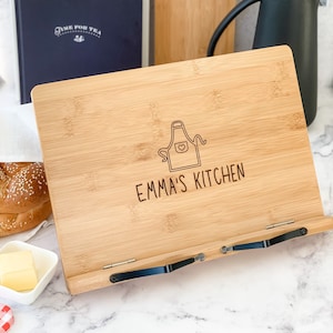 Personalized wooden recipe holder or customized cookbook holder for cookbooks and family recipes. Cookbook stand gift bundle that comes with a drawstring bag and a bookmark.