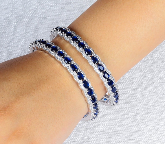 Buy Simulated Blue Sapphire Color Diamond Bangle Bracelet in Silvertone  (6.00 in) 2.85 ctw at ShopLC.