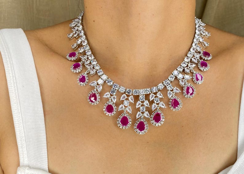Cubic Zirconia, Tyaani Jewelry, Amrapali Jewelry, Blue India Jewerly, American Diamond, Sabyasachi Inspired, Pakistani jewelry, Nita Ambani Jewelry, ruby jewerly set, ruby necklace, ruby diamond, ruby statement, pink stone jewelry,
