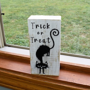 Trick or Treat Cat Shelf Sitter