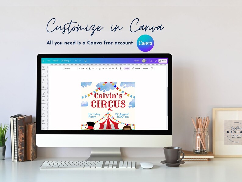 May include: A computer screen shows a Canva design for a circus-themed birthday party invitation. The invitation features a red and white circus tent, a top hat, and the text "Calvin's Circus". The screen also shows the text "Customize in Canva".