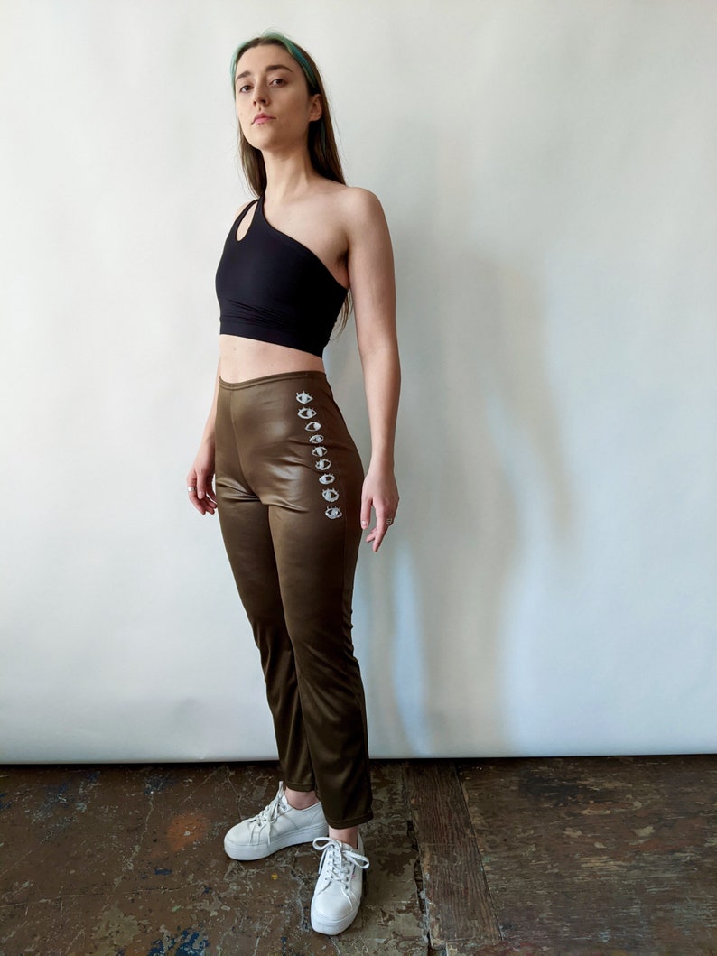 Recycled Sustainable Fitted Flare Army Green Wet Look Pants with Eye Design Hand Painted by Montreal Artist