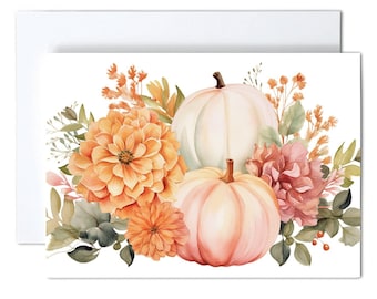 May include: A set of 10 note cards with envelopes featuring a watercolor illustration of two pumpkins, one white and one light orange, surrounded by orange dahlias, pink flowers, and green foliage. The text Note Cards Set of 10 with Envelopes is below.