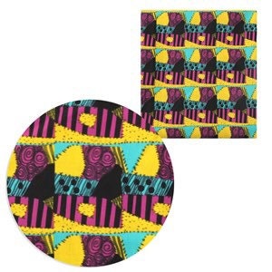 May include: A colorful fabric with a patchwork design featuring black, yellow, pink, blue, and green colors. The fabric has a repeating pattern of various shapes and lines.
