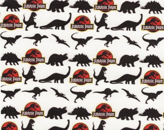 May include: A white background with a repeating pattern of black dinosaur silhouettes and the Jurassic Park logo. The logo is red, yellow, and white with the words "Jurassic Park" in a yellow outline.