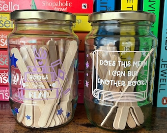 Books to be read and Tracker glass jars with gold lid